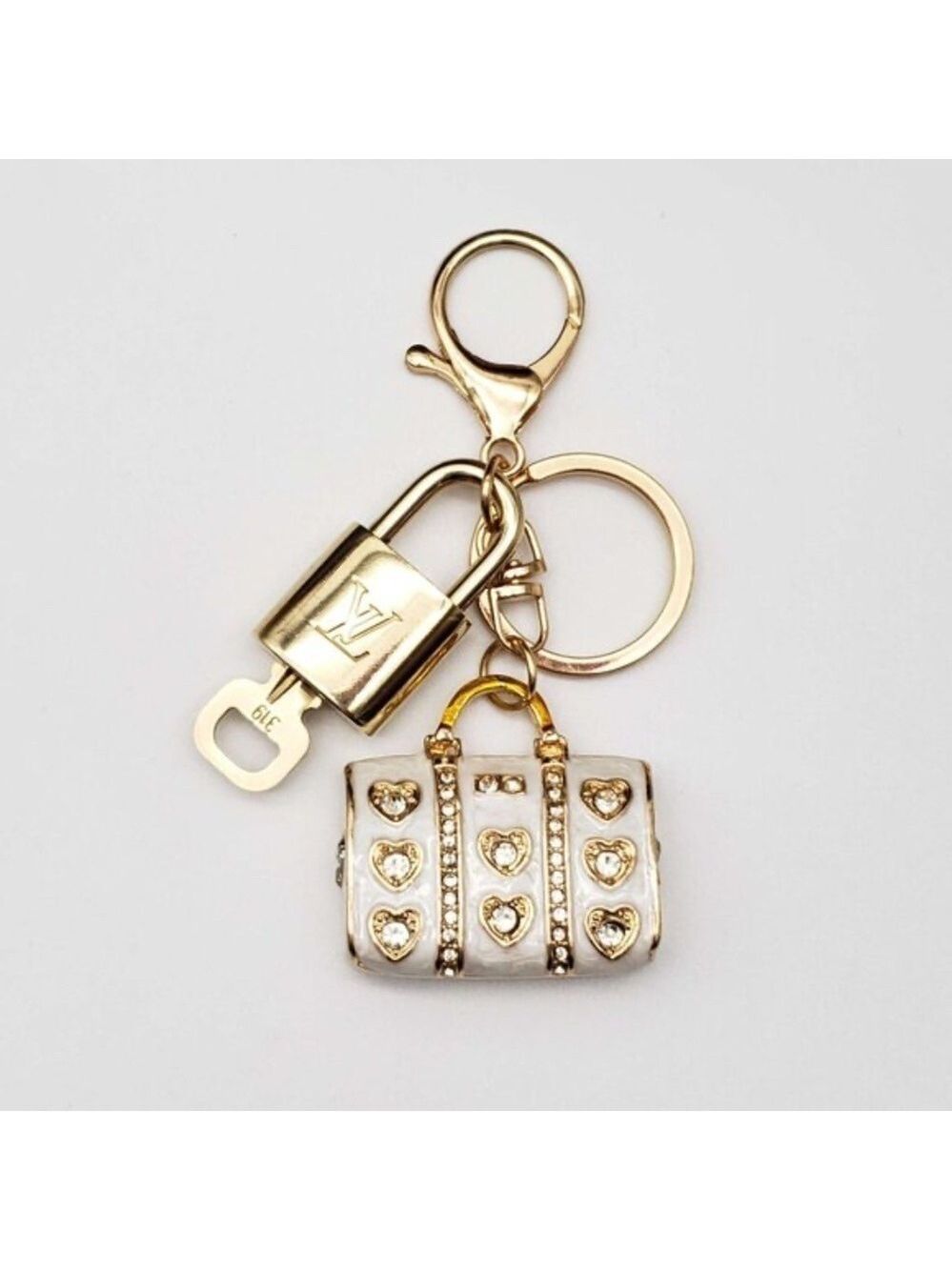 100% Auth Louis Vuitton Lock & Key with unbranded Bagcharm, Keycharm, Keychain